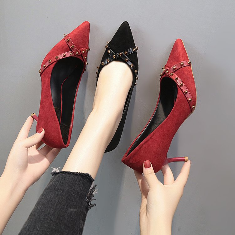 Pointed rivet high heels